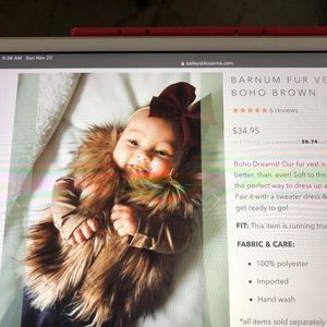 Bailey’s Blossoms. Fur vest.  Sz 0-3 months  NWT